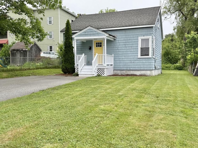 10 Turgeon St, Lewiston, ME 04240 - view of front of home with roof with shingles
