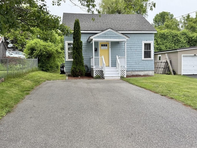 10 Turgeon St, Lewiston, ME 04240 - bungalow with roof with shingles and asphalt driveway
