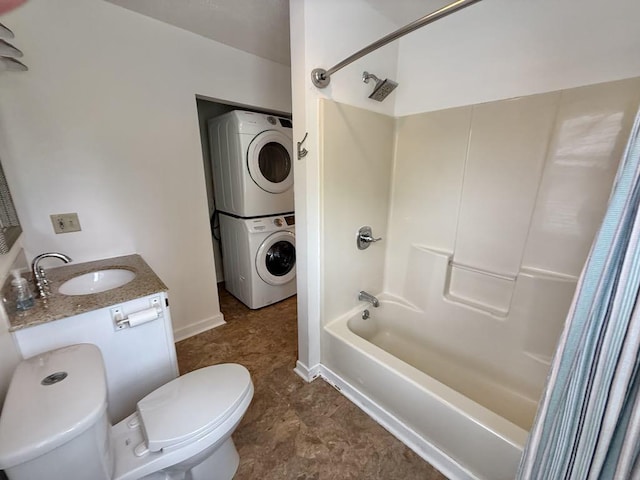 10 Turgeon St, Lewiston, ME 04240 - bathroom with stacked washer / dryer, shower / bath combo with shower curtain, and vanity