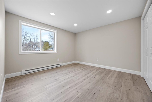 184 Jackson Rd, Waldoboro, ME 04572 - empty room featuring a baseboard heating unit, light wood-type flooring, and recessed lighting