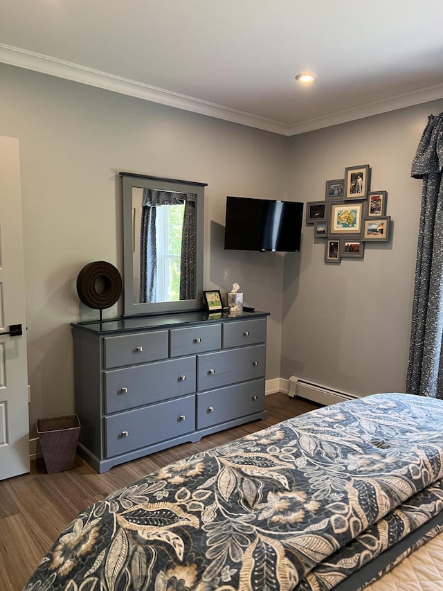 72 Cedar St, Calais, ME 04619 - bedroom featuring a baseboard heating unit, ornamental molding, dark wood finished floors, and recessed lighting