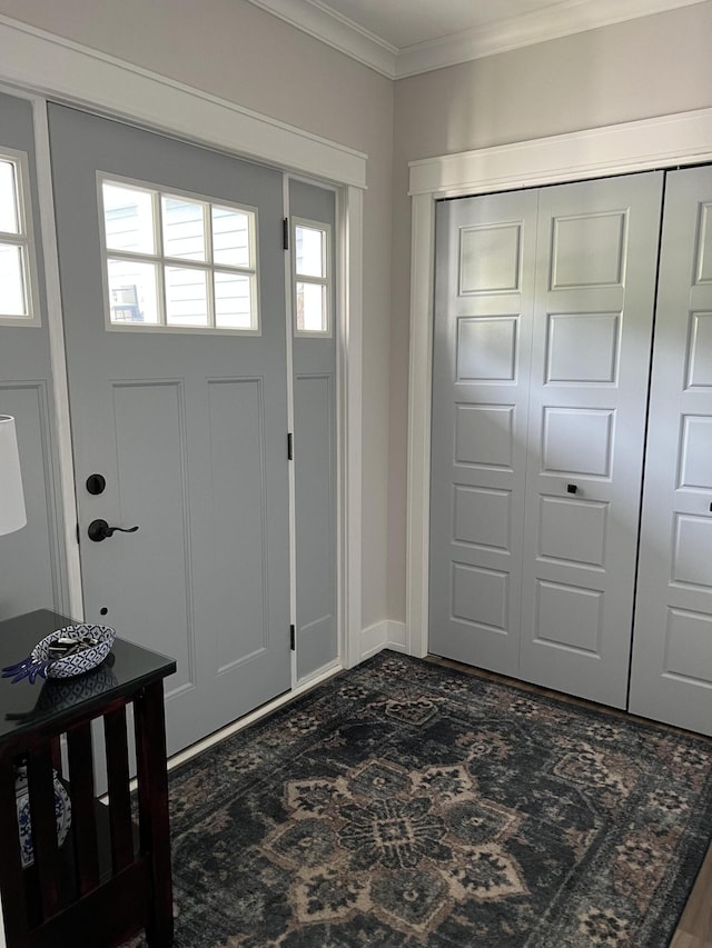 72 Cedar St, Calais, ME 04619 - entrance foyer with ornamental molding and baseboards