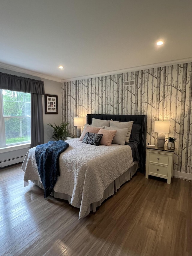72 Cedar St, Calais, ME 04619 - bedroom featuring dark wood finished floors, crown molding, recessed lighting, and a baseboard radiator
