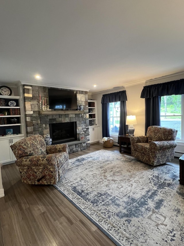 72 Cedar St, Calais, ME 04619 - living area with a fireplace, ornamental molding, and wood finished floors
