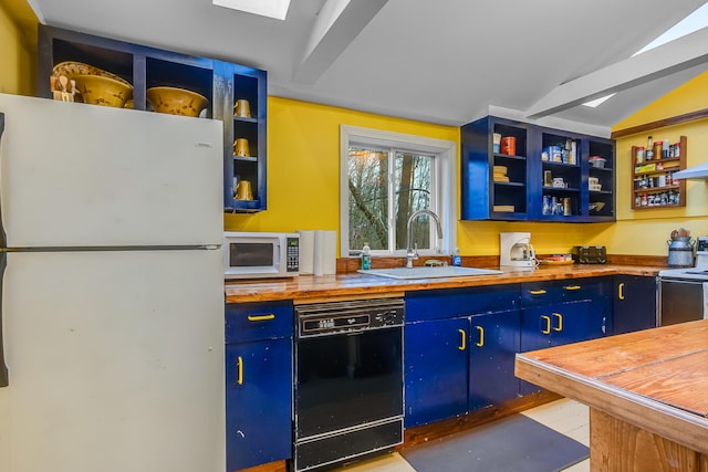 30 Troy Rd, Burnham, ME 04922 - kitchen with white appliances, open shelves, wood counters, blue cabinetry, and vaulted ceiling