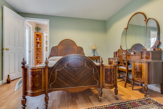 30 Troy Rd, Burnham, ME 04922 - bedroom featuring wood finished floors and multiple windows