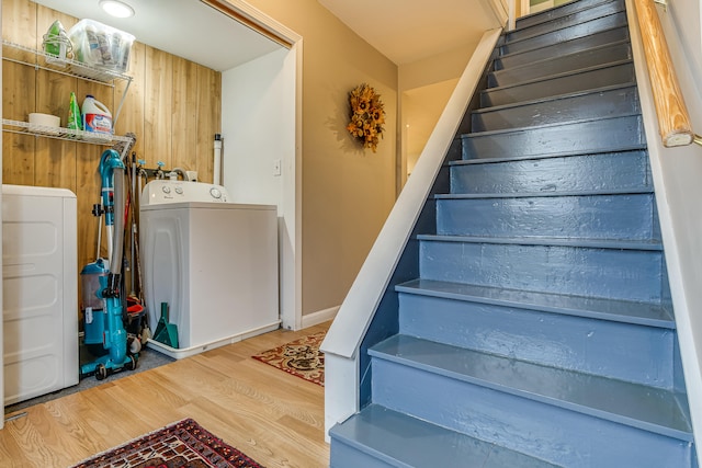 30 Troy Rd, Burnham, ME 04922 - stairs featuring wood finished floors and separate washer and dryer