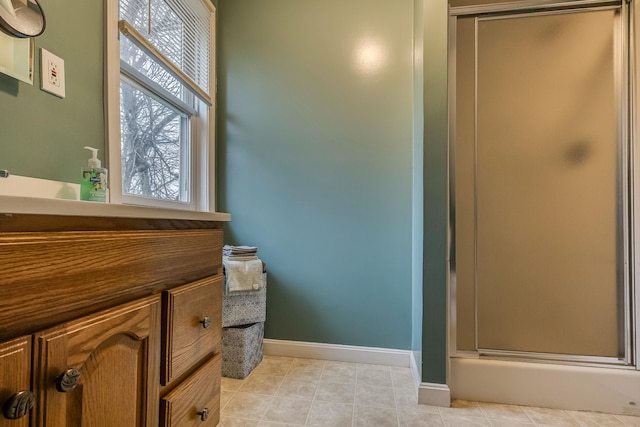 30 Troy Rd, Burnham, ME 04922 - bathroom with a shower stall, vanity, and tile patterned flooring