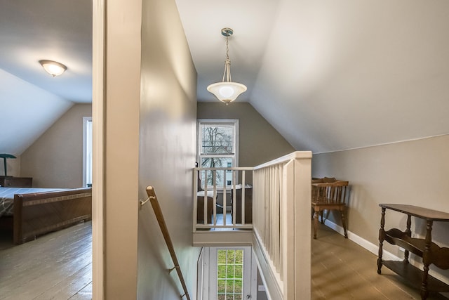 30 Troy Rd, Burnham, ME 04922 - staircase featuring vaulted ceiling, healthy amount of natural light, and wood finished floors
