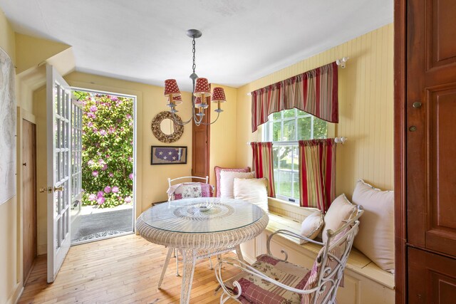 108 Colony Rd, Islesboro, ME 04848 - dining room with light wood-style floors and a chandelier
