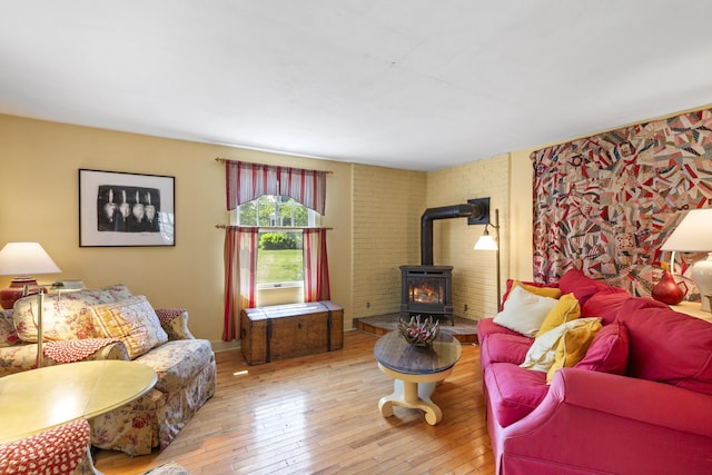 108 Colony Rd, Islesboro, ME 04848 - living room featuring a wood stove and hardwood / wood-style floors