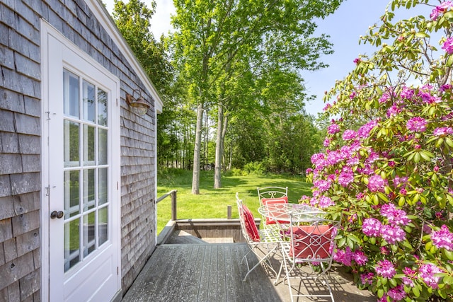 108 Colony Rd, Islesboro, ME 04848 - wooden deck featuring a lawn and outdoor dining space