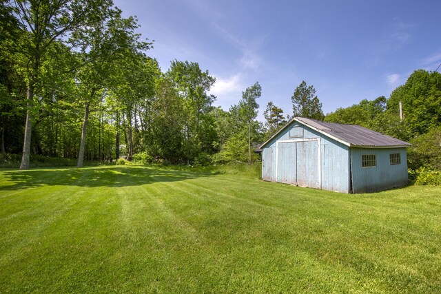 108 Colony Rd, Islesboro, ME 04848 - view of green lawn featuring an outdoor structure