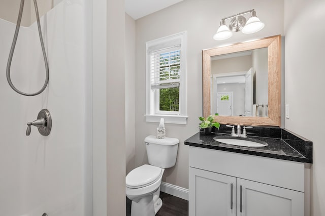 30 Pepperell Way Unit 58, Arundel, ME 04046 - bathroom featuring vanity, a shower, and wood finished floors