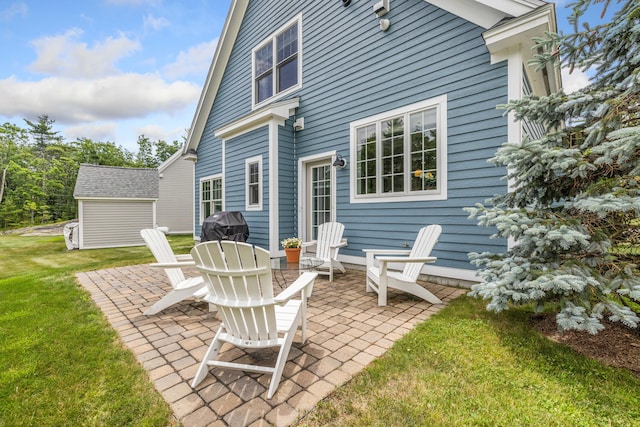 30 Pepperell Way Unit 58, Arundel, ME 04046 - back of house with a patio, a lawn, and an outdoor structure