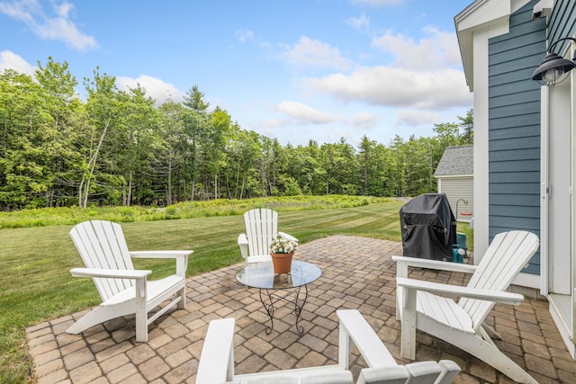 30 Pepperell Way Unit 58, Arundel, ME 04046 - view of patio / terrace featuring grilling area and a view of trees