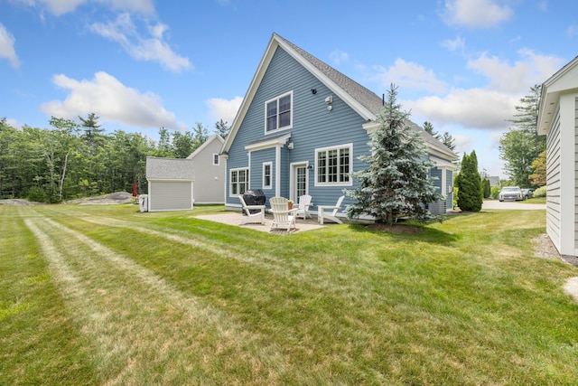 30 Pepperell Way Unit 58, Arundel, ME 04046 - back of house with a lawn and a patio