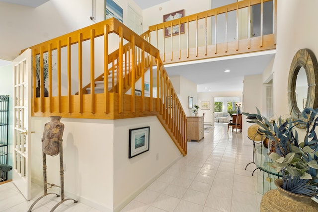 167 Hayden Point Rd, South Thomaston, ME 04858 - stairway with a towering ceiling and tile patterned flooring
