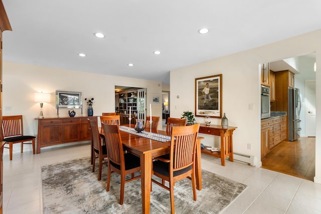 167 Hayden Point Rd, South Thomaston, ME 04858 - dining area with recessed lighting, light tile patterned floors, and a baseboard radiator