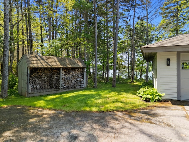 167 Hayden Point Rd, South Thomaston, ME 04858 - view of green lawn with an outbuilding
