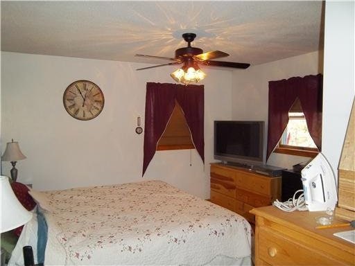 1 Weather Way, Dover-Foxcroft, ME 04426 - bedroom featuring ceiling fan