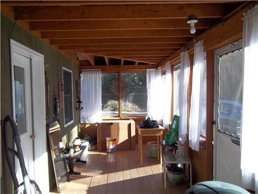 1 Weather Way, Dover-Foxcroft, ME 04426 - sunroom featuring hardwood / wood-style flooring and a wooden deck