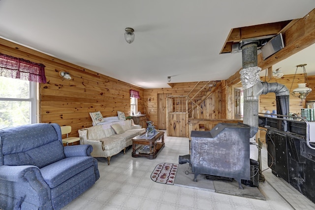 M18L1 Troutdale Rd, The Forks Plt, ME 04985 - living area with a wood stove, wood walls, and tile patterned floors