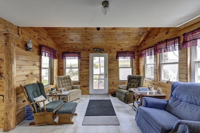 M18L1 Troutdale Rd, The Forks Plt, ME 04985 - living room with vaulted ceiling, wooden walls, and light floors