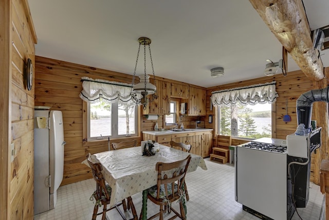 M18L1 Troutdale Rd, The Forks Plt, ME 04985 - dining space with wood walls and light flooring