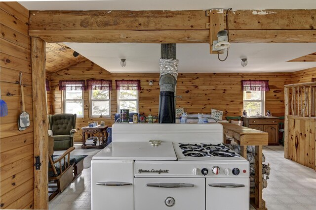 M18L1 Troutdale Rd, The Forks Plt, ME 04985 - kitchen featuring wooden walls, gas range gas stove, and light countertops