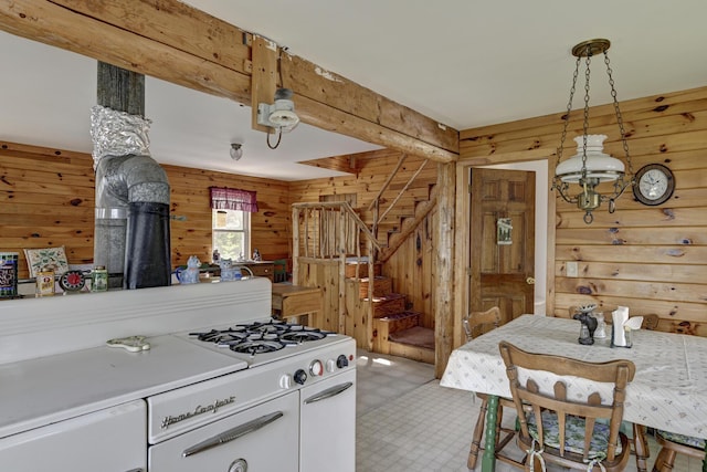 M18L1 Troutdale Rd, The Forks Plt, ME 04985 - kitchen with wood walls, a wood stove, and decorative light fixtures