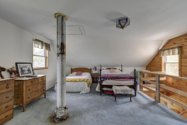M18L1 Troutdale Rd, The Forks Plt, ME 04985 - bedroom with vaulted ceiling, light colored carpet, and wooden walls