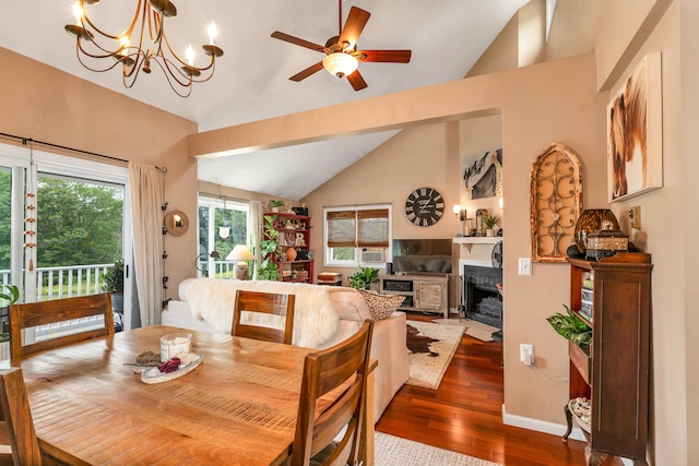 25 Riverview Dr Unit D, North Berwick, ME 03906 - dining space featuring lofted ceiling, wood finished floors, ceiling fan, a fireplace with flush hearth, and a chandelier