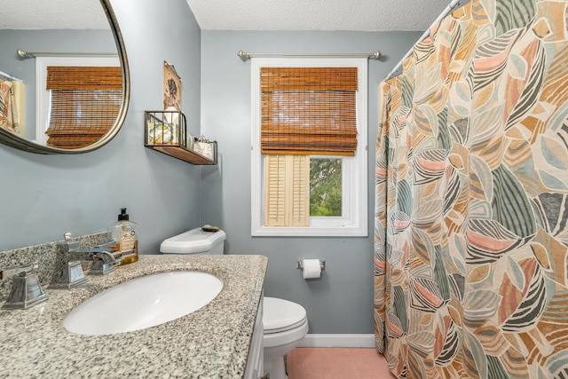 25 Riverview Dr Unit D, North Berwick, ME 03906 - bathroom featuring vanity, a textured ceiling, tile patterned floors, and a shower with shower curtain