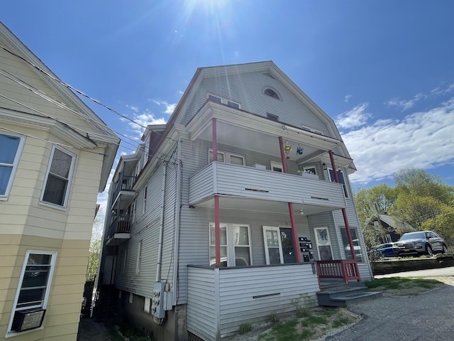 77 Maine Ave, Rumford, ME 04276 - view of front of property featuring a balcony and a porch