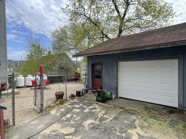 77 Maine Ave, Rumford, ME 04276 - garage featuring driveway