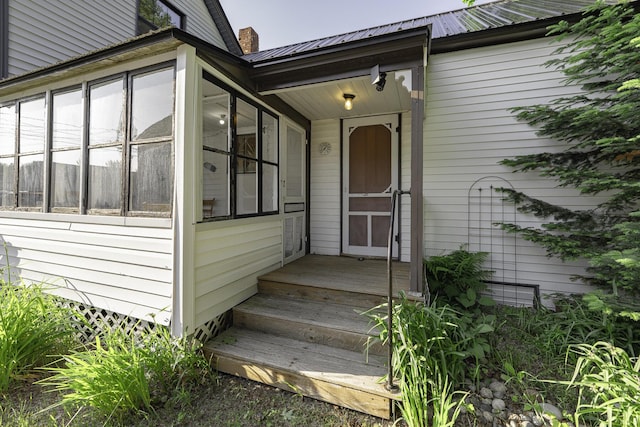7 Hazen St, Norway, ME 04268 - doorway to property featuring a metal roof and a chimney