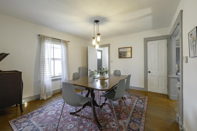 7 Hazen St, Norway, ME 04268 - dining space featuring wood finished floors and radiator