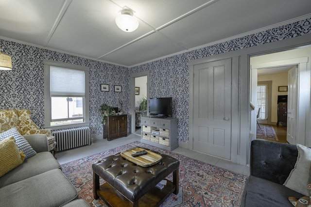 7 Hazen St, Norway, ME 04268 - living area featuring radiator heating unit, wallpapered walls, and crown molding