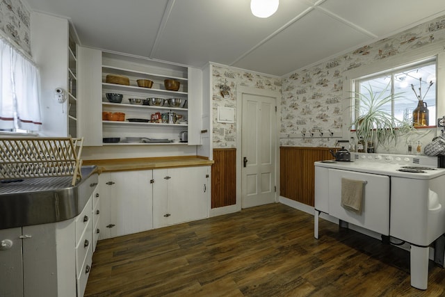 7 Hazen St, Norway, ME 04268 - kitchen featuring a wainscoted wall, wallpapered walls, dark wood-type flooring, white cabinets, and open shelves