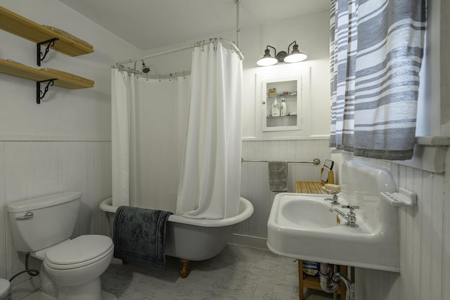 7 Hazen St, Norway, ME 04268 - bathroom with wainscoting, wood finished floors, and wooden walls