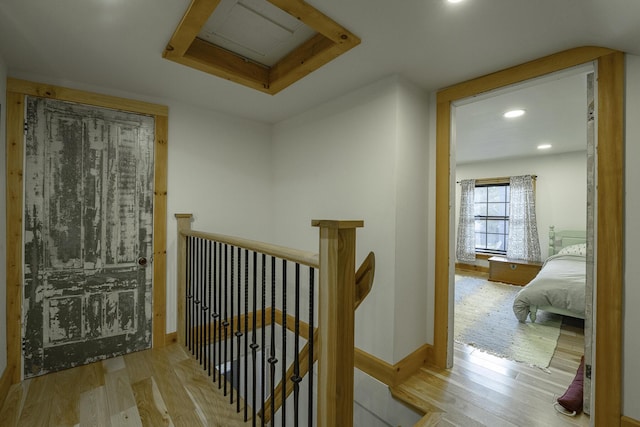 7 Hazen St, Norway, ME 04268 - hallway with an upstairs landing, wood finished floors, and recessed lighting