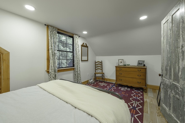 7 Hazen St, Norway, ME 04268 - bedroom with wood finished floors, vaulted ceiling, and recessed lighting