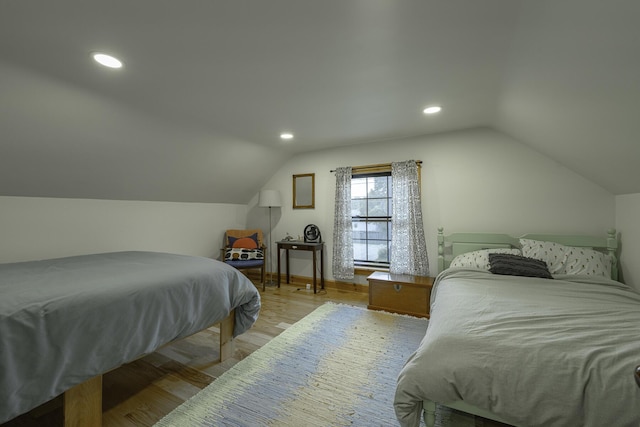 7 Hazen St, Norway, ME 04268 - bedroom featuring lofted ceiling, wood finished floors, and recessed lighting