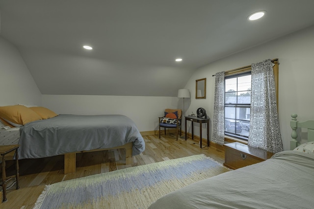 7 Hazen St, Norway, ME 04268 - bedroom featuring lofted ceiling, wood finished floors, and recessed lighting