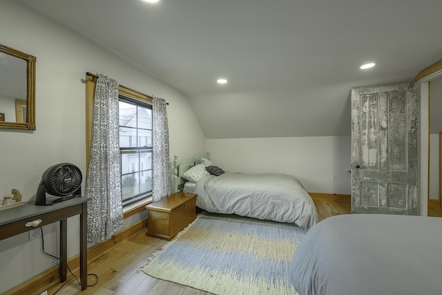7 Hazen St, Norway, ME 04268 - bedroom with vaulted ceiling, wood finished floors, and recessed lighting
