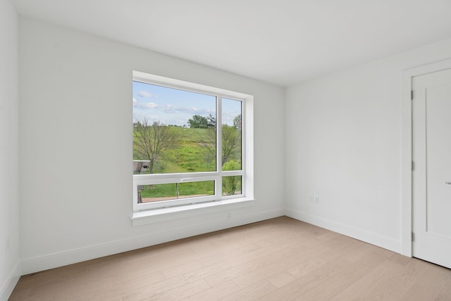 218 Washington Ave Unit 207, Portland, ME 04101 - empty room featuring light wood-style flooring and baseboards