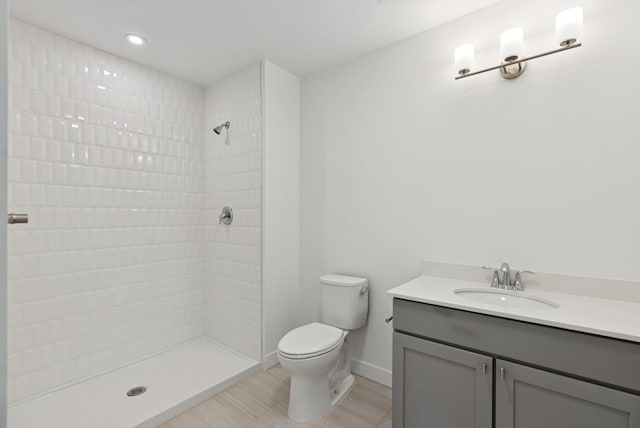 218 Washington Ave Unit 207, Portland, ME 04101 - bathroom with a tile shower, vanity, and recessed lighting