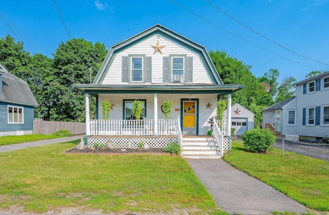 12 Court St, Rochester, NH 03867 - dutch colonial featuring a gambrel roof, covered porch, and cooling unit