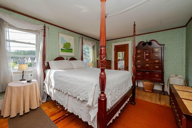 12 Court St, Rochester, NH 03867 - bedroom with crown molding, wood finished floors, and wallpapered walls